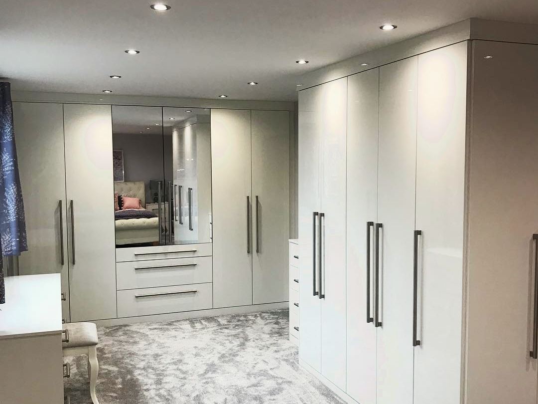 High gloss white fitted bedroom furniture